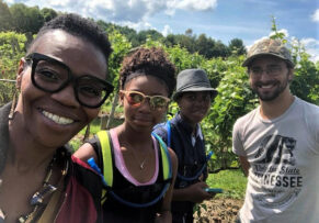 group of people on the vineyard tour